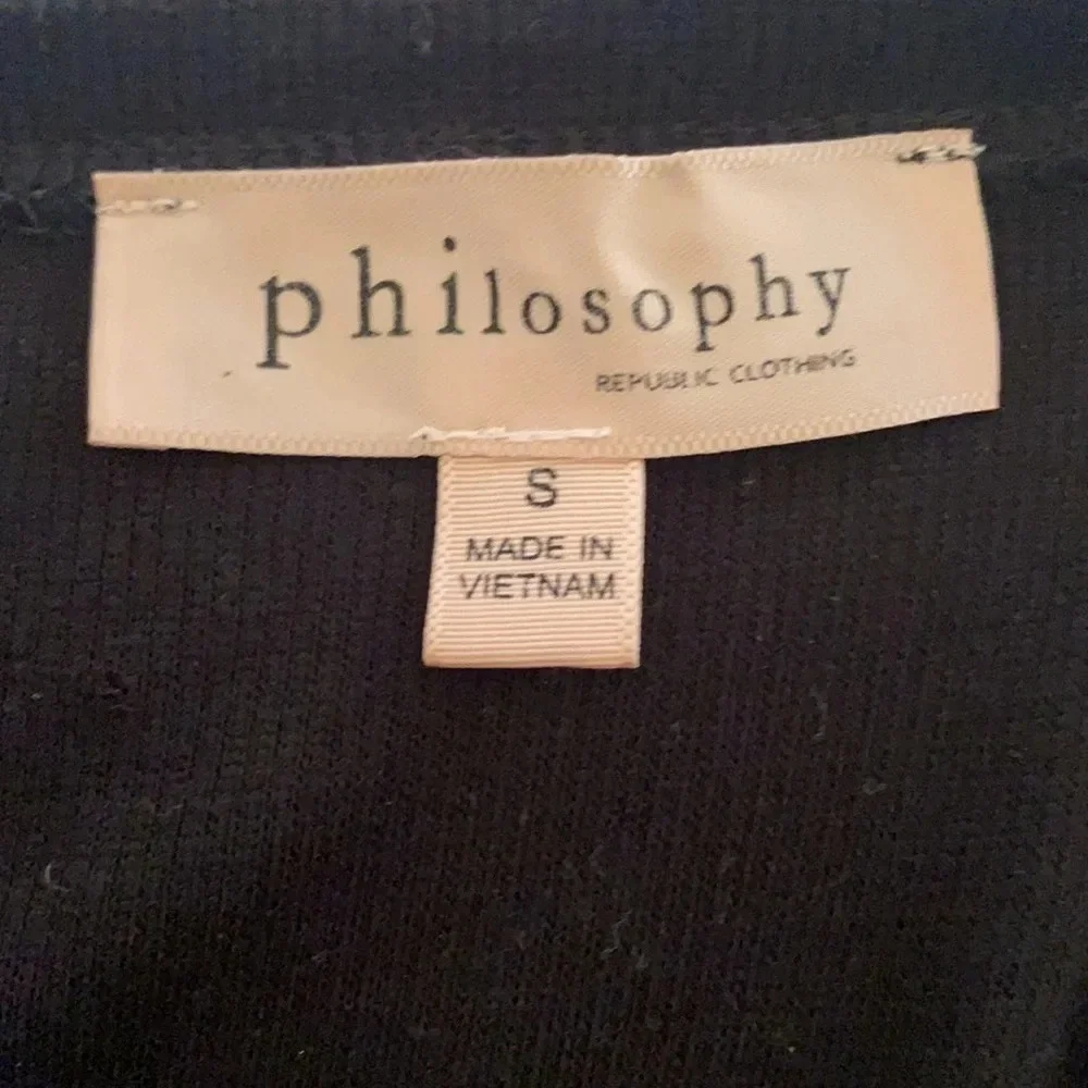 Philosophy black V-neck sweater size small angled bottom